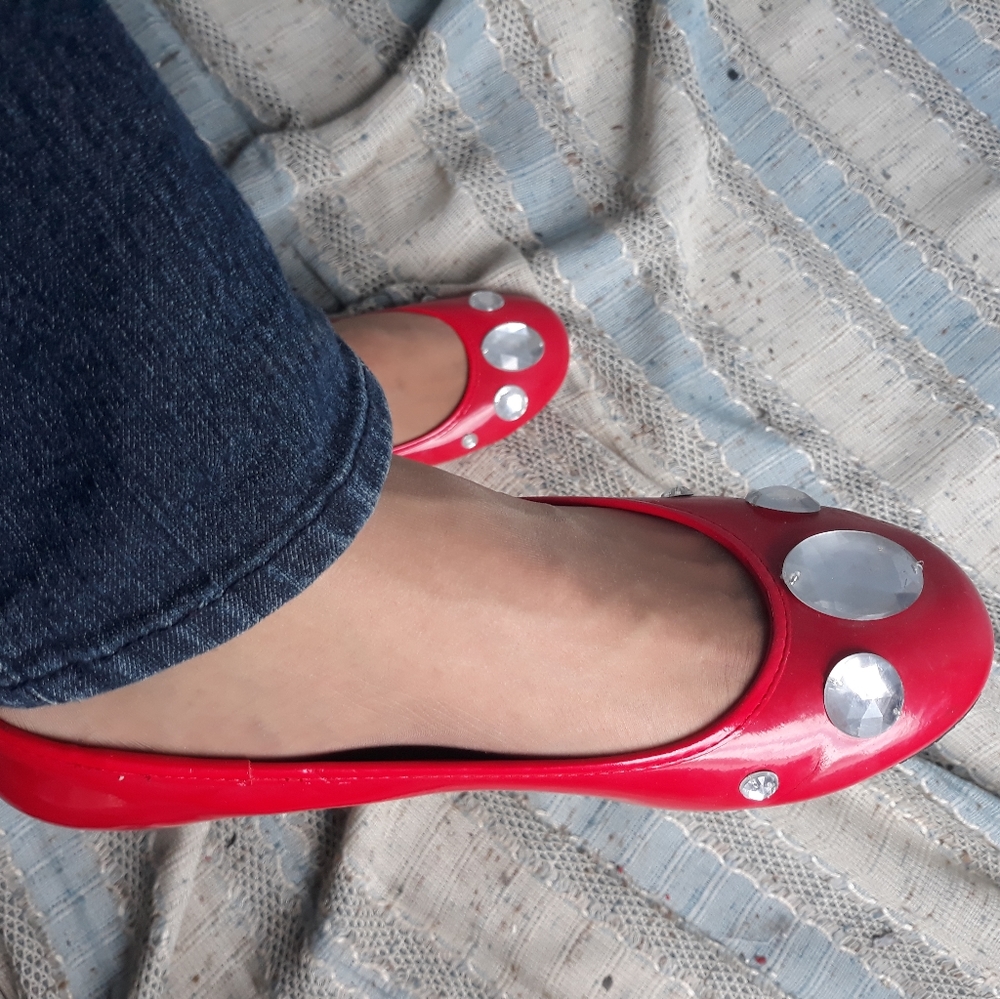 Red Jennifer Lauren flats with jeweled toes.